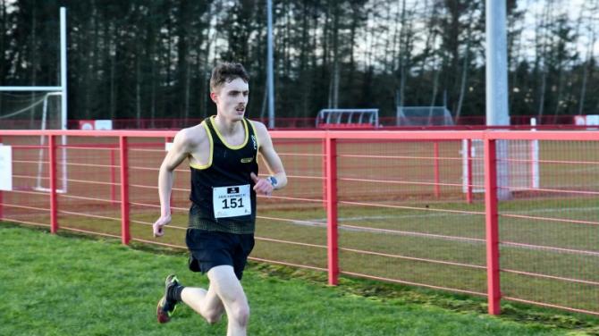 Harriers in cross-country action